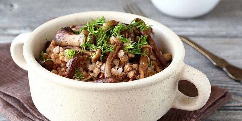 Buckwheat porridge with mushrooms for lunch in a healthy eating menu